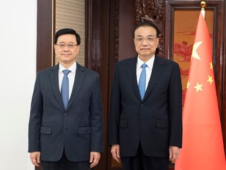 李克强会见来京述职的李家超 韩正出席