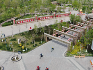 七师胡杨河市骑行热带动绿色出行